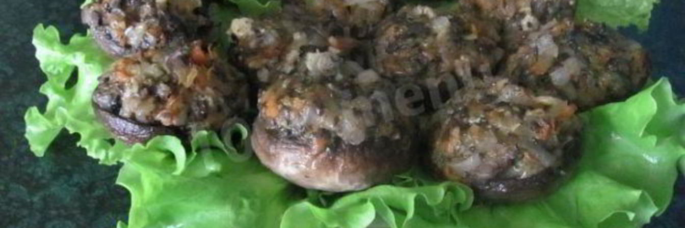 Фаршированные шампиньоны в духовке с сыром