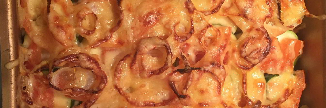 Цукини, запеченные с помидорами и сыром