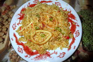 Паэлья с кальмарами в пиве