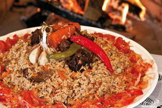 Плов в казане на плите