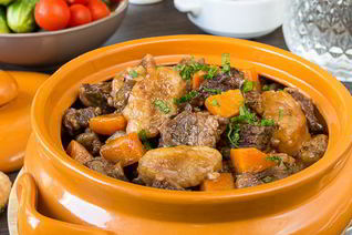 Рагу из говядины с грибными клецками