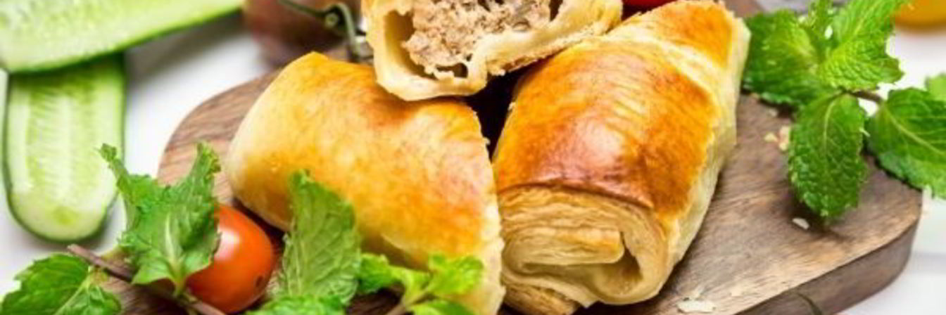 Пирожки с мясом из слоеного теста в духовке